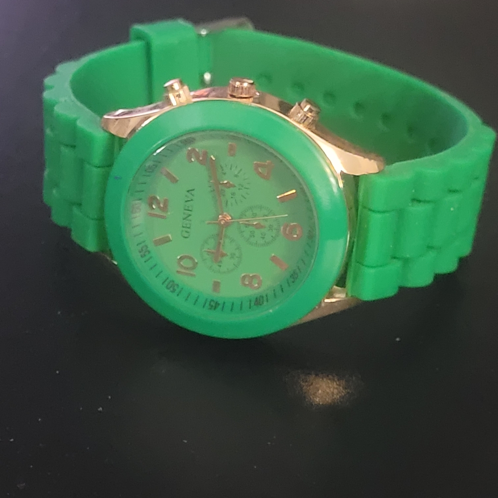 Green Geneva Watch with Gold Accents
